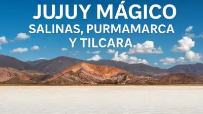 “Paisaje panorámico de las Salinas Grandes en Jujuy con el Cerro de los Siete Colores al fondo y texto sobreimpreso que dice ‘Jujuy Mágico: Salinas, Purmamarca y Tilcara’.”